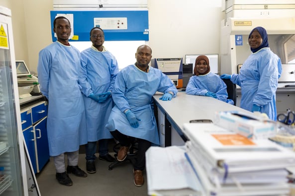 The Mycobacteriology and Immunology Research Team (MIRT). From left to right: Muhammed Nyang (MSc, Gambia), Dr. Kein Kalume (MD, DR Congo), Dr. Leopold Tientcheu (Associate Professor, Team Leader, Cameroon), Fatou Faal (PhD student, Gambia), and Dobally Touray (BSc, Gambia)